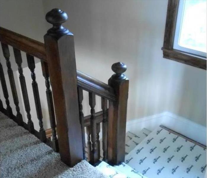 refinished banisters, new carpeting and paint