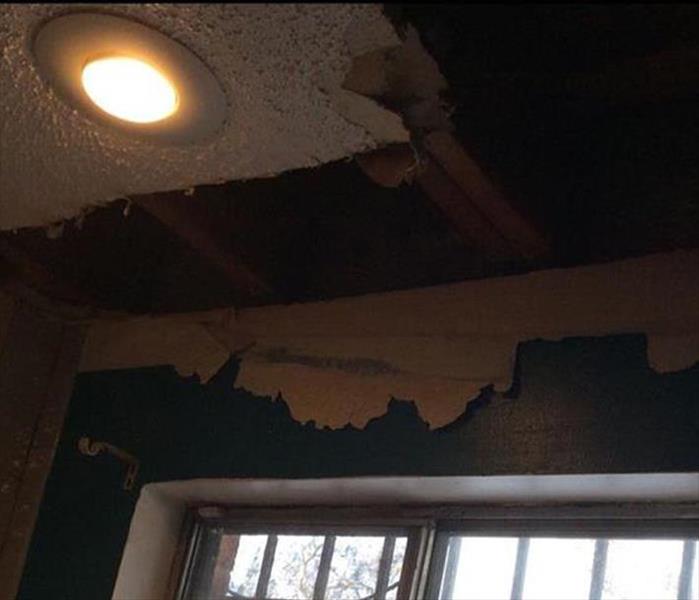 high hat light on, damage walls and ceiling peeling 